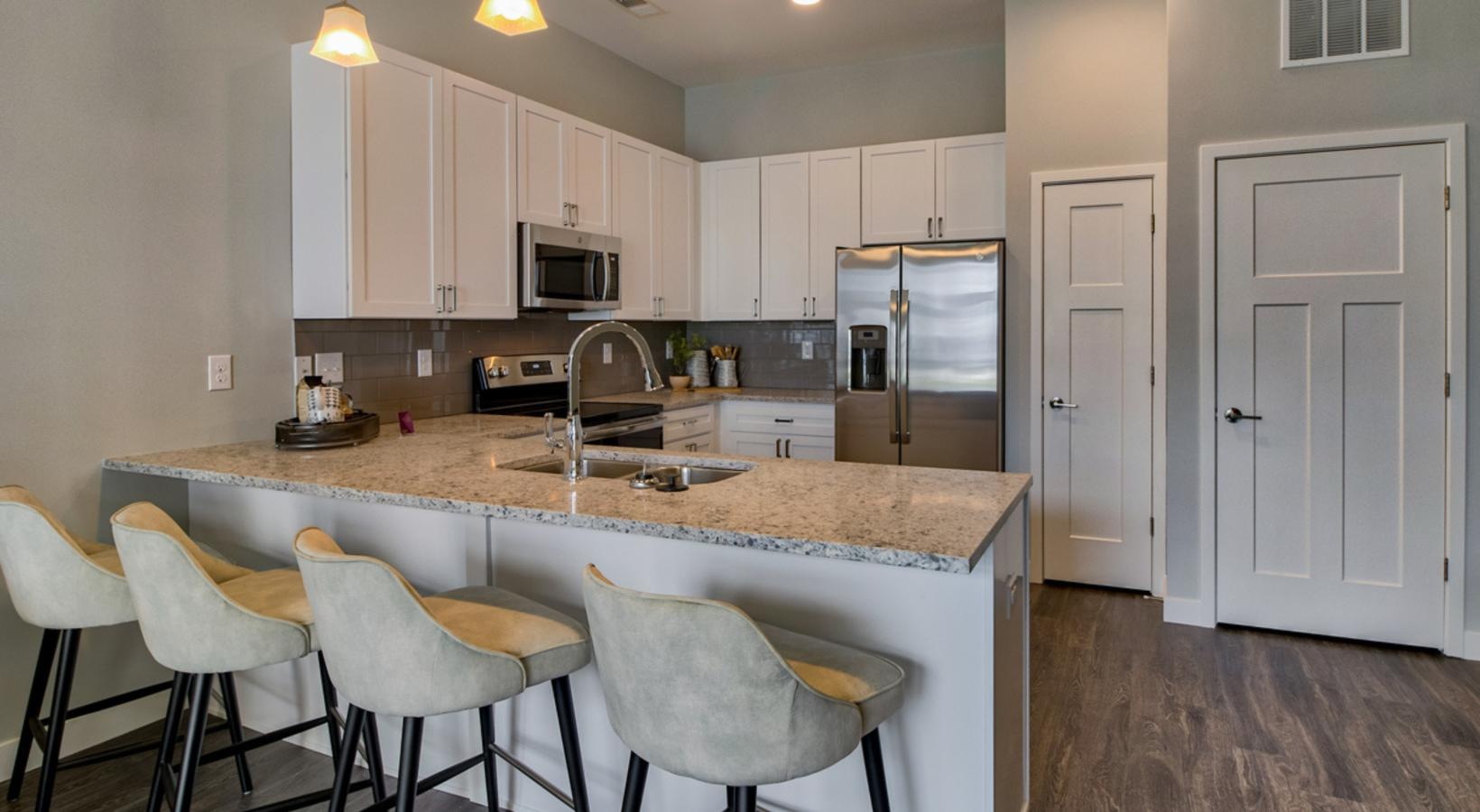 Beautiful kitchens with designer finishes a kitchen with white cabinets