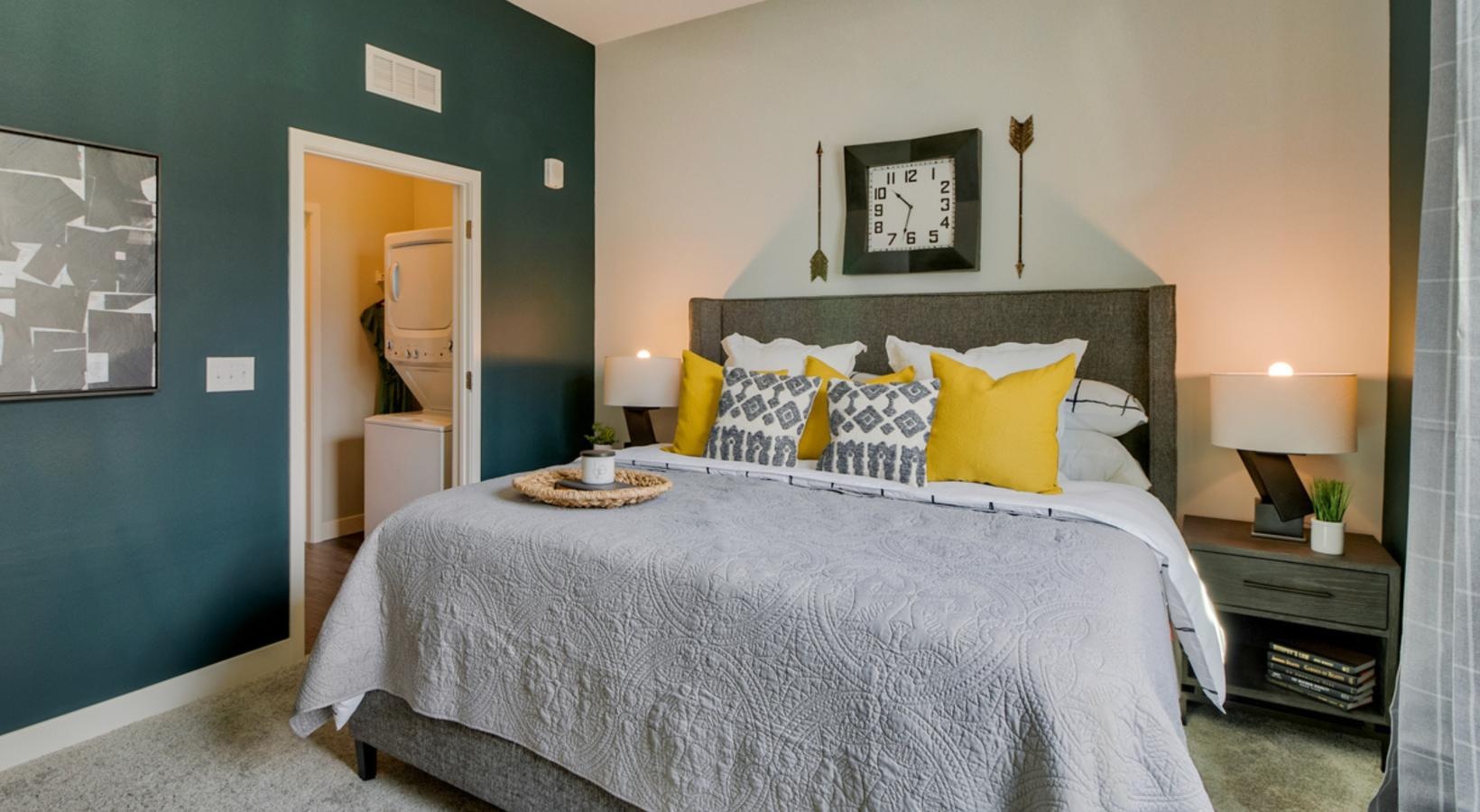 Relax and recharge in beautiful and spacious bedrooms a bed in a room